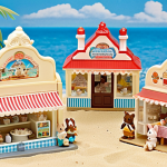 A sprawling display of Sylvanian Families, showcasing a meticulously recreated seaside village. Include a miniature ice cream parlor, a sandy beach, and various Sylvanian characters enjoying a sunny day. The display should highlight the detail and artistry of the collector, with clear acrylic risers creating different levels and miniature accessories adding interest. Focus on a bright and cheerful color palette.